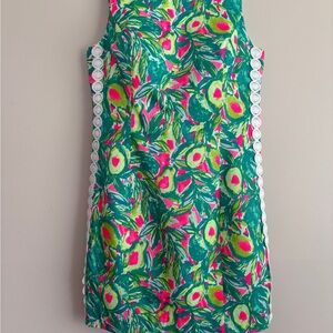 Lilly Pulitzer Green and Pink Floral Dress with side lace. Zippered scoop back.